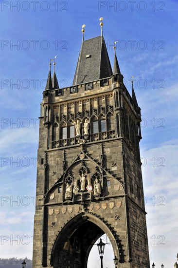 Old Town Bridge Tower on Charles Bridge in Prague, Gothic tower with ornate architectural details,
