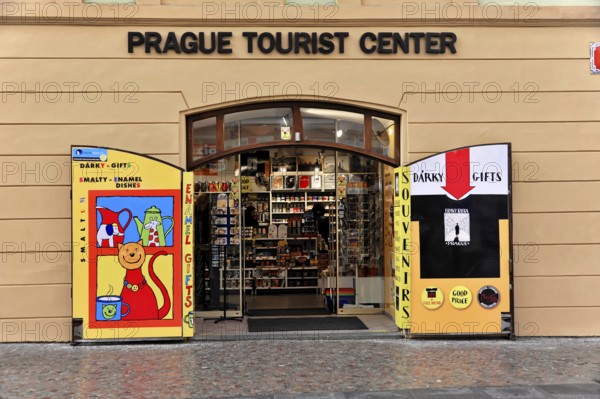 Prague, Czech Republic, Europe, Colourful shop front of a tourist centre with open doors and