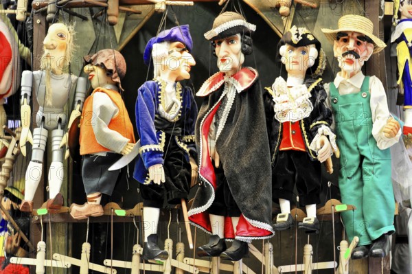 Prague puppets, Prague, Czech Republic, Europe, Differently dressed puppets lined up, colourful and