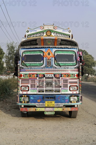Kota, Rajasthan, North India, Asia, Colourfully decorated Indian truck on the shoulder of a country