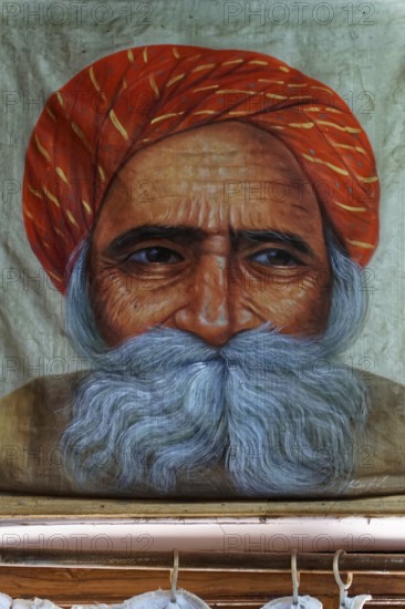 Painting, Sale, Souvenir, Udaipur, Rajasthan, India, Asia, Close-up of an elderly man with red