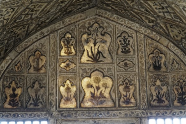 Red Fort, Agra, Uttar Pradesh, India, Floral patterns and ornate decoration in a historic building