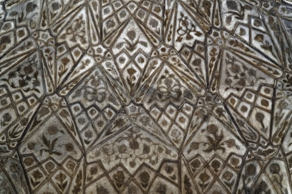 Red Fort, Agra, Uttar Pradesh, India, Artfully decorated patterns and details on a symmetrical