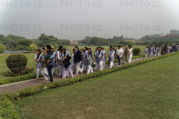 Agra, Jodhpur, Rajasthan, North India, Asia, A large group of people in uniforms walk along a path