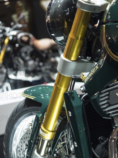 Detail of the front suspension of a modern motorbike with golden fork, dortmund, deutchland
