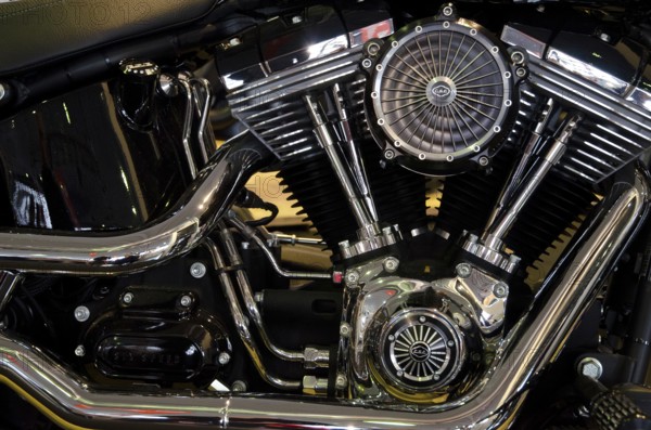Detailed view of a shiny Harley-Davidson motorbike engine, impressive mechanical workmanship,
