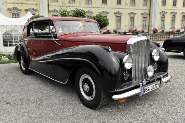 Red and black Bentley classic car with striking lines and classic style, Retro Classics meets