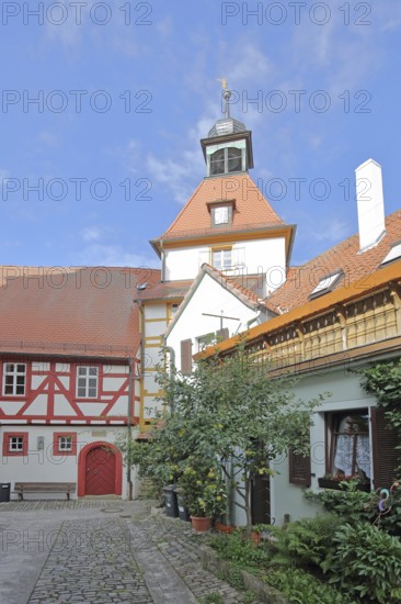 Fortified church with town musician tower and town hall from behind, gate tower, half-timbered