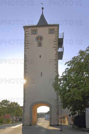 Lower tower built in 1234 in backlight, historical town tower, town gate, light mood, Haßfurt,