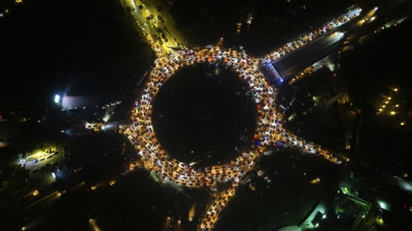 Aerial view shows crowds of Syrians celebrating in Umayyad Square in central Damascus after the