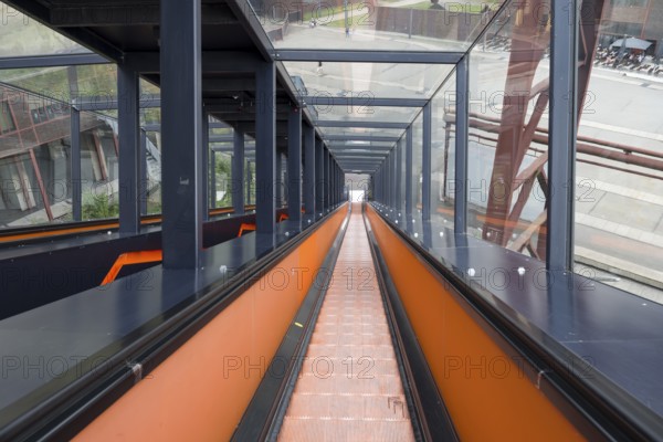 Orange escalator descending, visitor centre, Ruhr Museum, Zeche Zollverein, UNESCO World Heritage