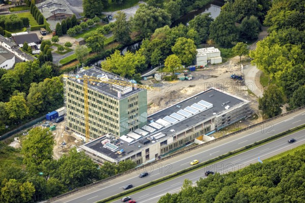 Aerial view, Arnsberg town hall on the A46 motorway, construction site with new building, Neheim,