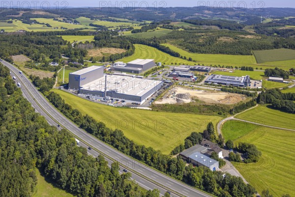 Aerial view, industrial area, industrial park Grünewald with construction site, motorway A45, hilly