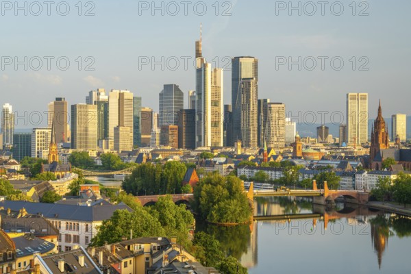Frankfurt City Skyline, Residential Buildings, Bridges and Main River on Sunny Morning. Aerial View