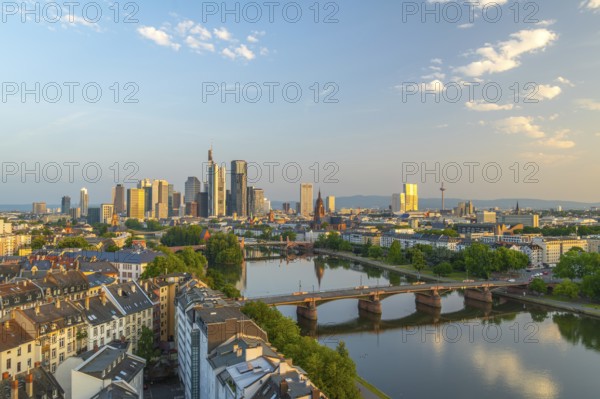 Frankfurt City Downtown, Residential Buildings, Bridges and Main River at Sunrise. Wide Shot.
