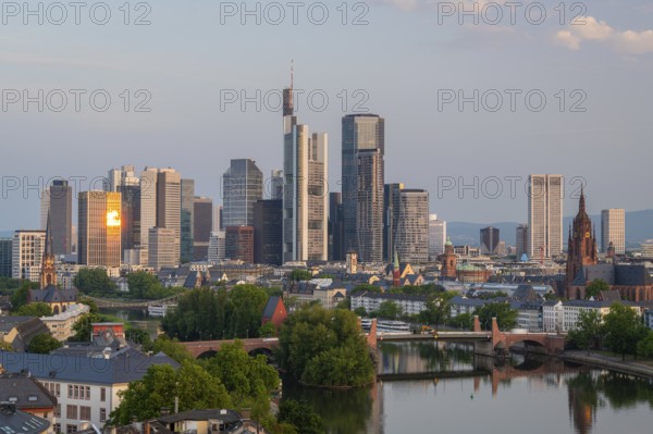 Frankfurt City Skyline, Residential Buildings, Bridges and Main River at Sunrise. Aerial View.