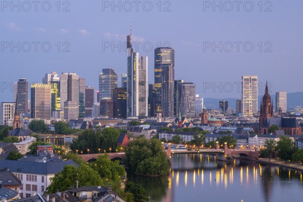 Illuminated Frankfurt City Skyline, Residential Buildings, Bridges and Main River at Morning