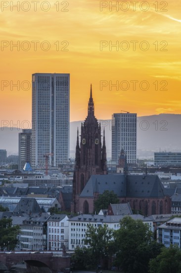 Frankfurt Cathedral, Residential Buildings and City at Fiery Sunset. Gothic Church. Aerial View.