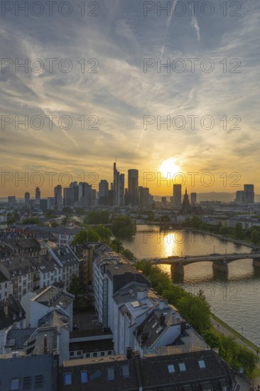Frankfurt City Skyline, Residential Buildings, Bridges and Main River at Sunset. Wide Shot. Aerial