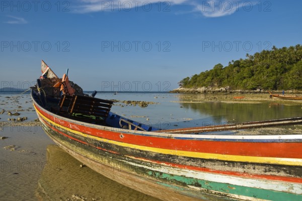 Longtail boat impressions in Siam Bay on Racha Yai Island off the southern tip of the Thai holiday