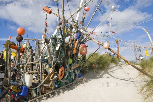 Works of art made from rubbish washed up from the sea in the dune landscape of the North Frisian