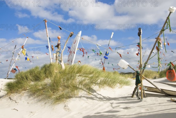 Works of art made from rubbish washed up from the sea in the dune landscape of the North Frisian