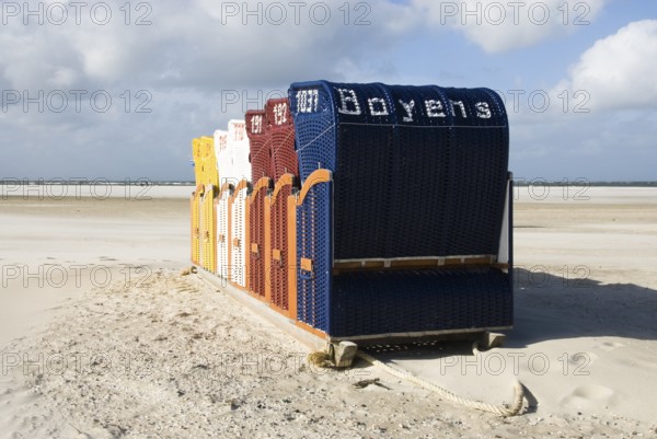 The beach chairs in the village of Norddorf on the North Frisian island of Amrum go into