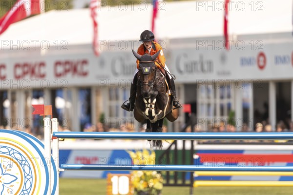 Sanne Thijssen of the Netherlands, riding Cupcake Z, competes in the first round of the 2025 BMO
