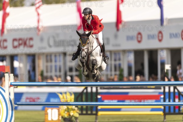 Roy Van Beek of Belgium, riding Cavoiro-H Old, competes in the first round of the 2025 BMO Nations