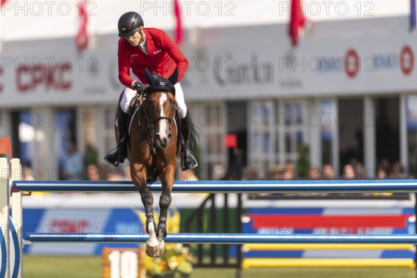 Max Kuhner of Austria, riding Count on Me, competes in the first round of the 2025 BMO Nations Cup