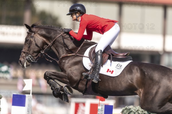 Erynn Ballard of Canada, riding Dior, competes in the first round of the 2025 BMO Nations Cup
