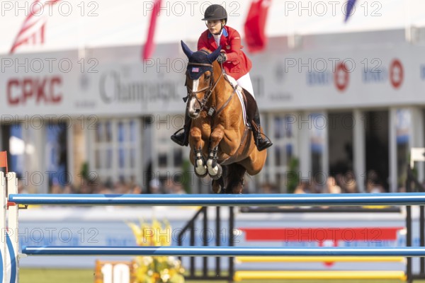 Elena Haas of the USA, riding Claude, competes in the first round of the 2025 BMO Nations Cup