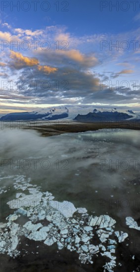 Ice floes, glacier, glacier lake, glacier lagoon, morning light, cloudy mood, panorama, summer,