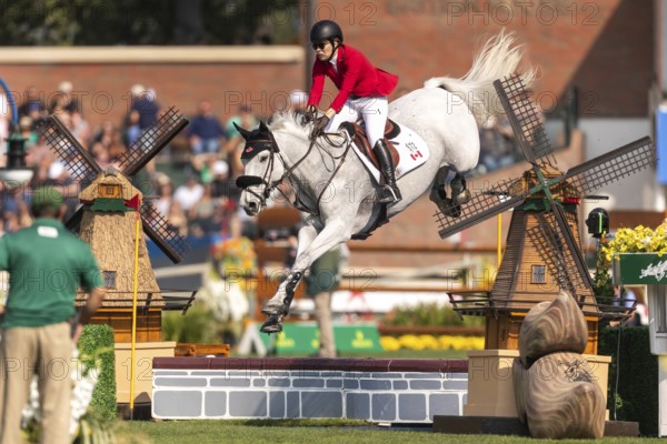 Susan Horn of Canada, riding, Dominka Van De Lucashoeve, competes in the first round of the 2025