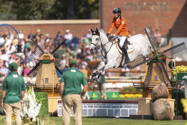 Kevin Jochems of the Netherlands, riding Camilla Van de Helle, competes in the first round of the