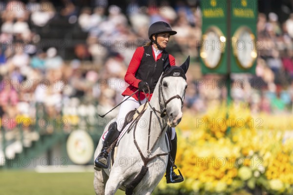 Katharina Rhomberg of Austria, riding Colestus Cambridge, competes in the first round of the 2025