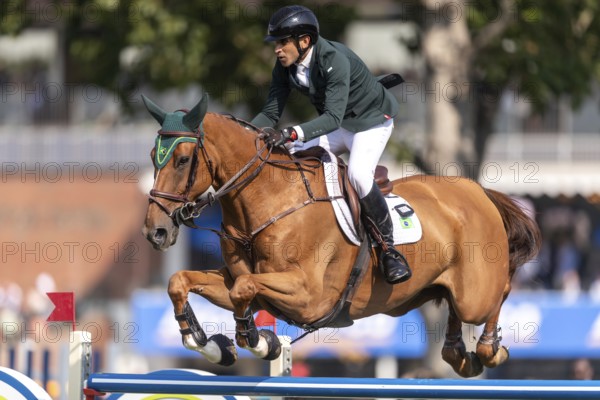 Gabriel De Matos Machado of Brazil, riding Nyles Van de Mottelhoeve, competes in the first round of