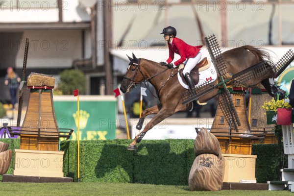 Tiffany Foster of Canada, riding Electrique, competes in the first round of the 2025 BMO Nations