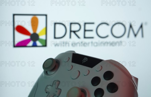 Dhaka, Bangladesh- 12 June 2025: A close-up of a gamepad with the Drecom seen on screen in the