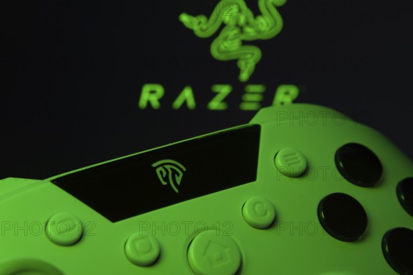 Dhaka, Bangladesh- 13 Sep 2025: A close-up of a gamepad with the Razer seen on screen in the