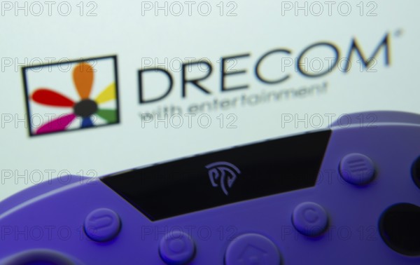 Dhaka, Bangladesh- 12 June 2025: A close-up of a gamepad with the Drecom seen on screen in the