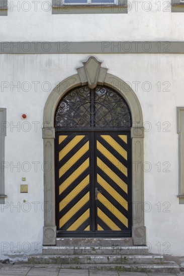 West façade with wooden gate and iron grille, New Castle in Kisslegg, Allgäu, Baden-Württemberg,