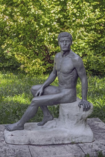 Male sculpture, bronze copy, title Wäcnter, by WLHELM RIEDISSER, in the castle park in Kisslegg,