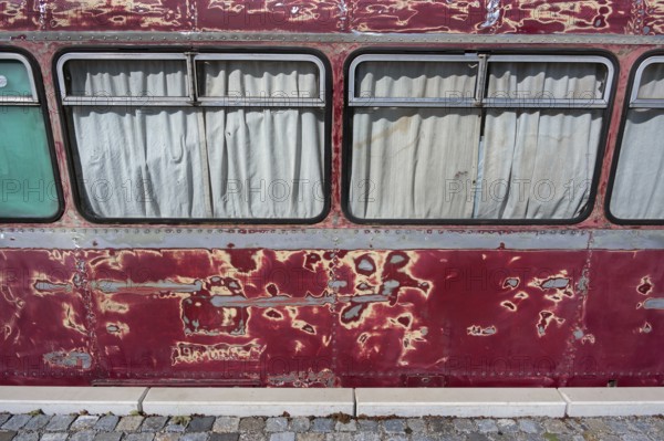 Sanded red paint, a rail bus from the 1950s is being renovated at the Spatz youth centre, Kisslegg,