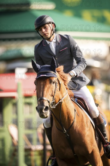 Joseph Stockdale of Great Britain, riding Ebanking, competes in the 2025 Spruce Meadows Masters on