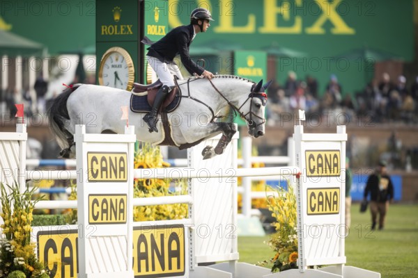 Roy Van Beek of Austria, riding Cavoiro-H Old, competes in the 2025 Spruce Meadows Masters on