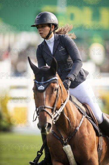 Alessandra Reich of Austria, riding Oeli R, competes in the 2025 Spruce Meadows Masters on