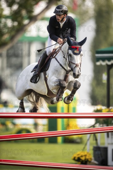 Roy Van Beek of Austria, riding Cavoiro-H Old, competes in the 2025 Spruce Meadows Masters on