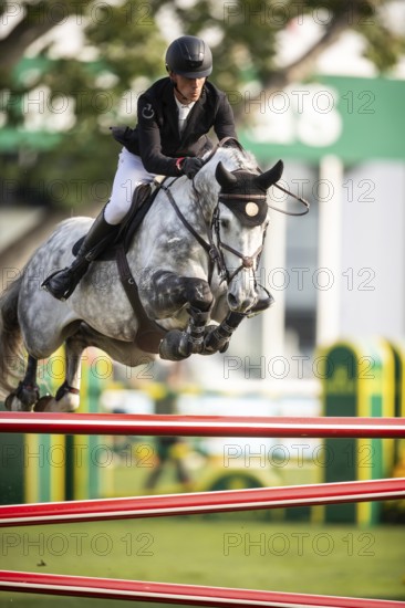 Kevin Jochems of the Netherlands, riding Csquetto Van De Helle competes in the 2025 Spruce Meadows