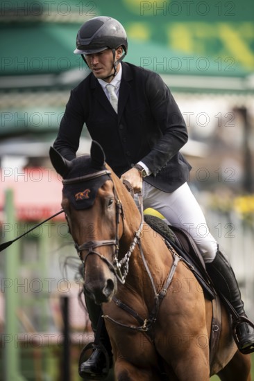 Kristaps Neretnieks of Austria, riding Valour competes in the 2025 Spruce Meadows Masters on